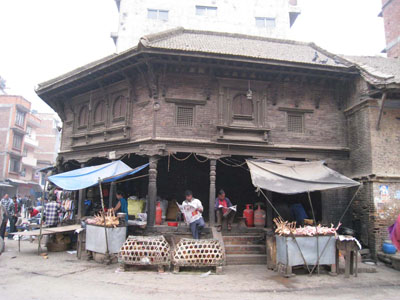 Photo 4: Hawkers of the chicken in Patan. Just an hour before soaking downpour.